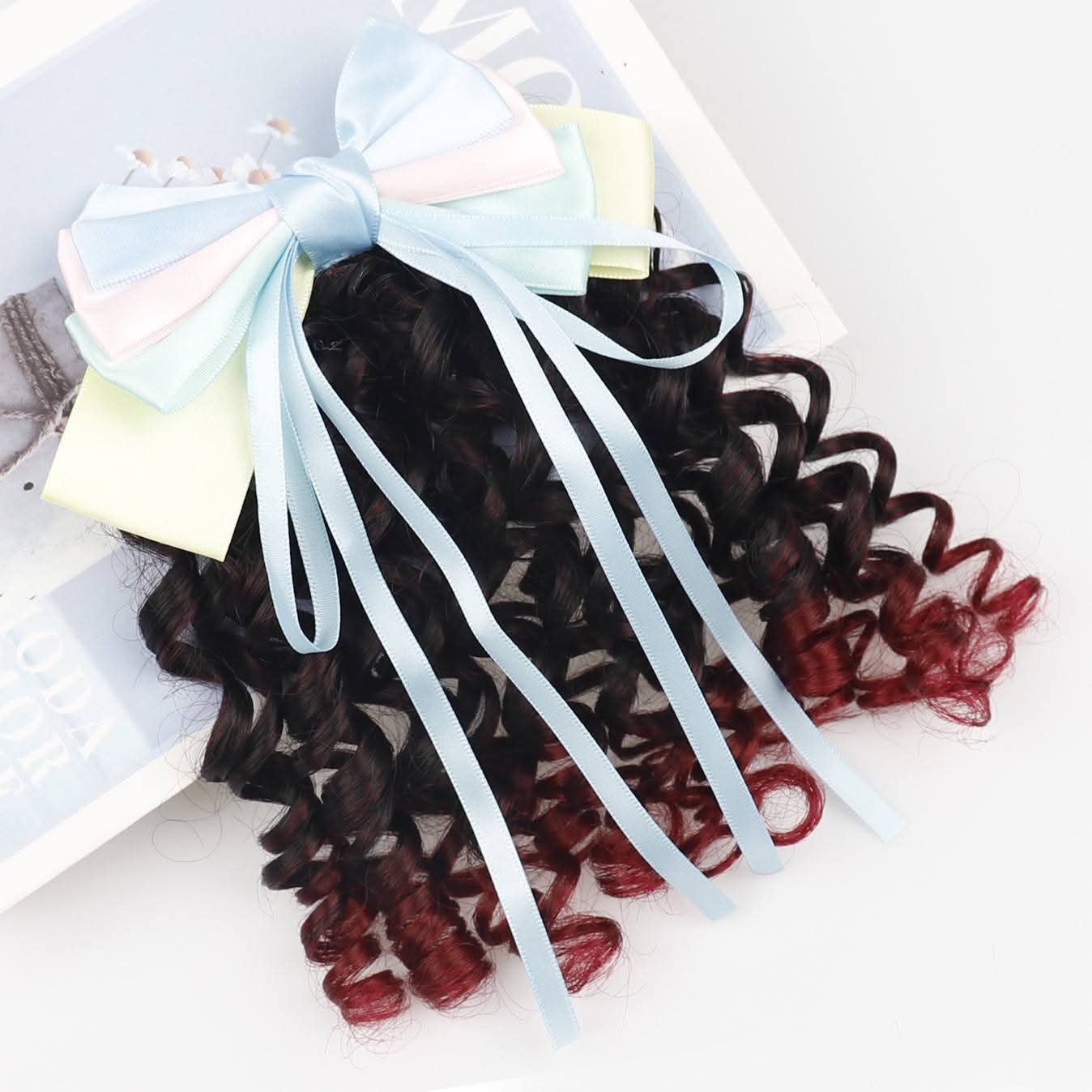 Twisted Rolled Hair with bow clip
