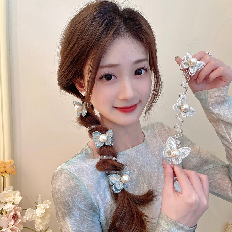 Butterfly twist clip